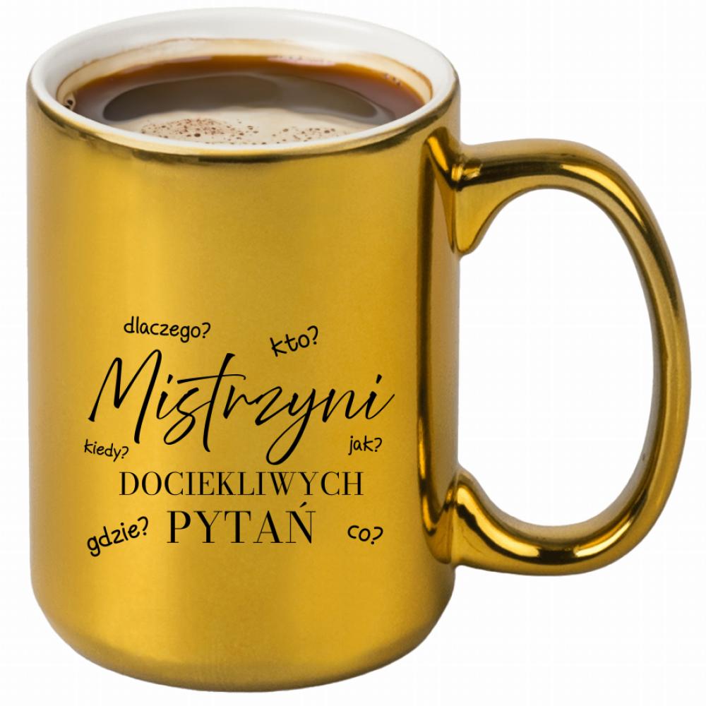 MISTRZYNI DOCIEKLIWYCH PYTAŃ kubek złoty kolor biały