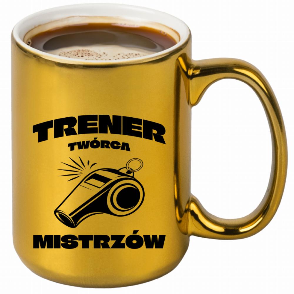 Tu się nie gwizda – tu się działa! kubek złoty kolor niebieski